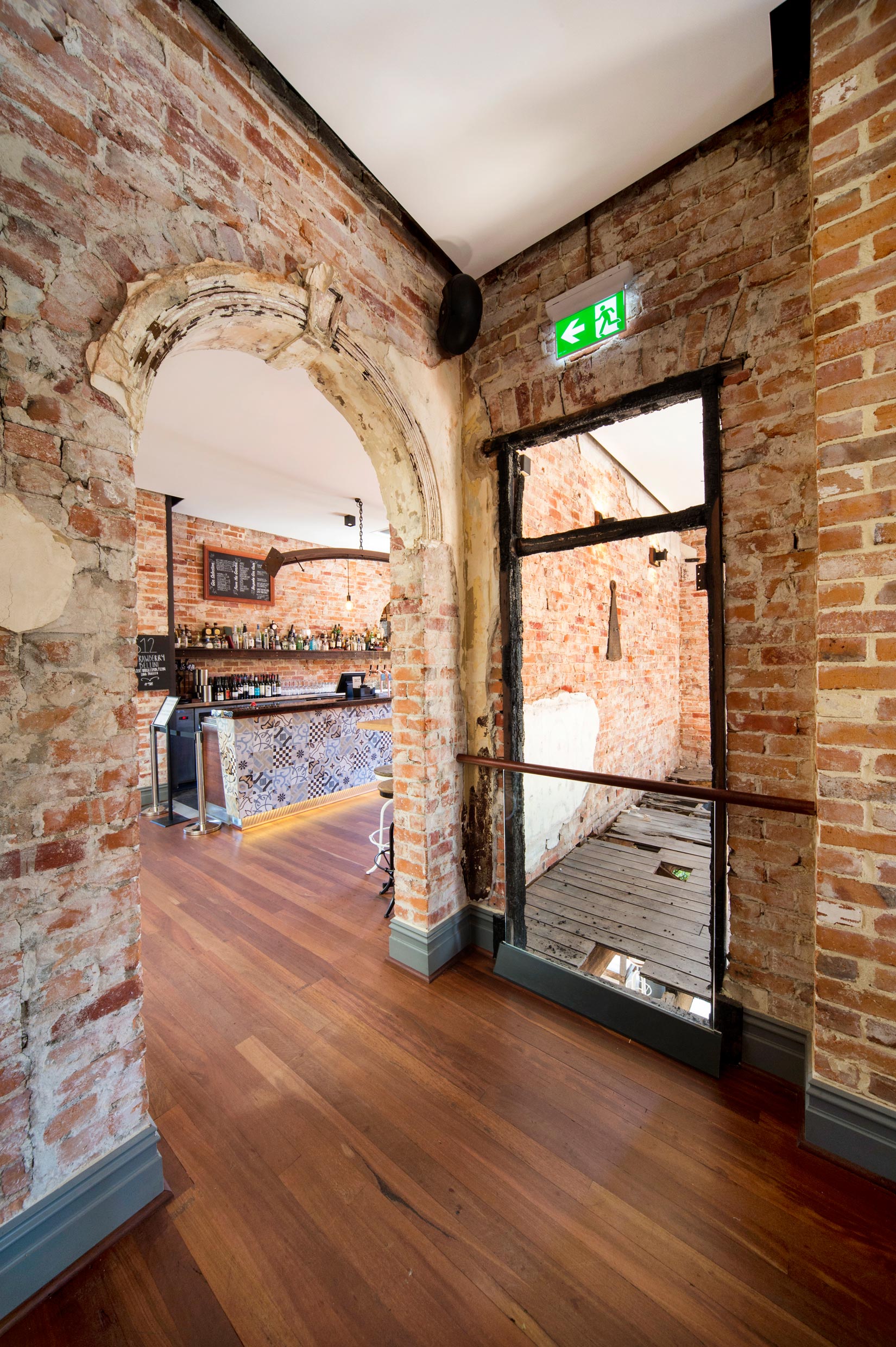 The Guildford Hotel restored brick wall with arch doorway