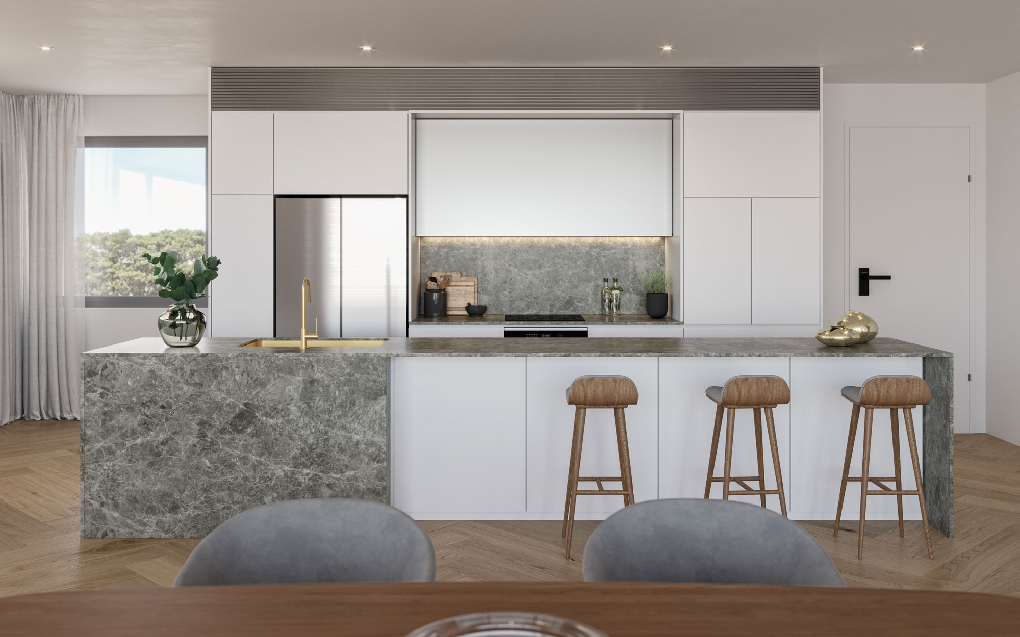 Modern kitchen with marbled island bench, white cabinets, and timber parquetry flooring in Elizabeth Residences Cottesloe Apartments