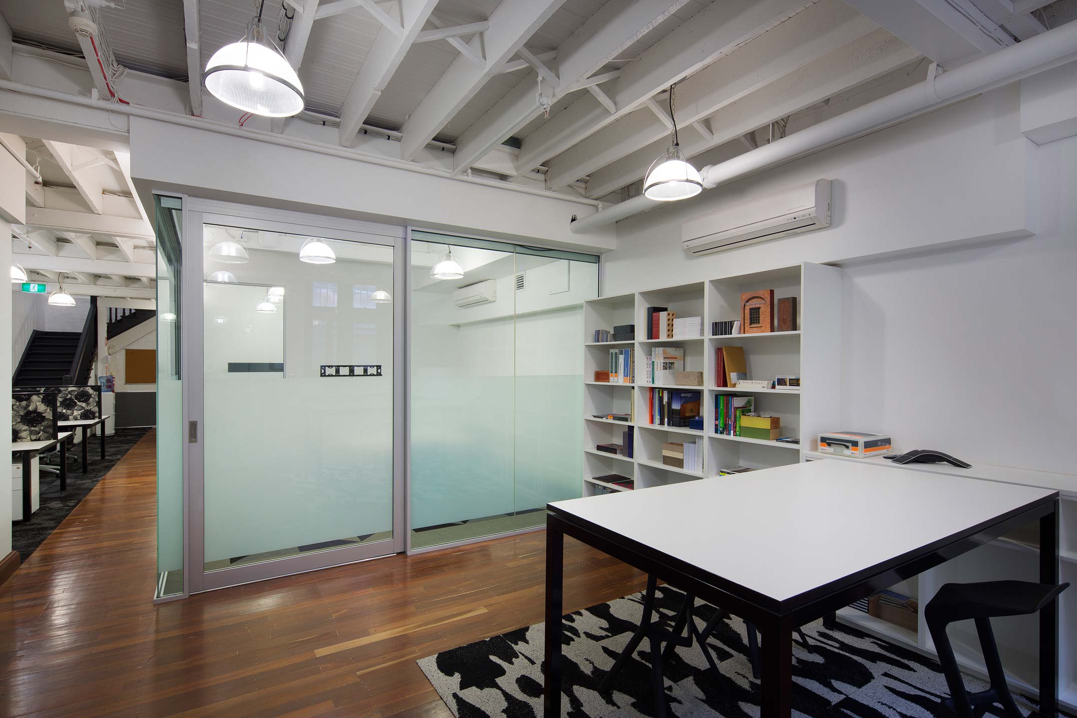 Austral Brickworks design studio office with timber flooring and white timber ceiling