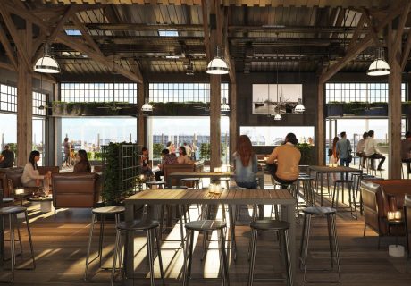 fremantle heritage warehouse bar and dining area with ocean views, large timber beams, and warehouse lights